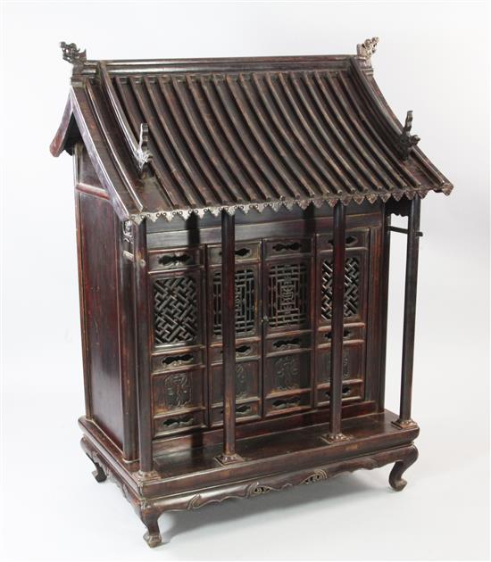 A Chinese stained elm shrine cabinet, 19th century, H.128cm W.95cm D.63cm